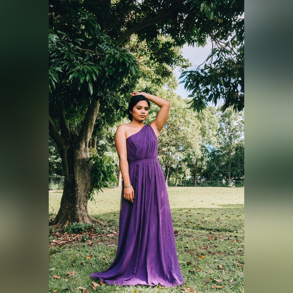 Purple one shoulder gown